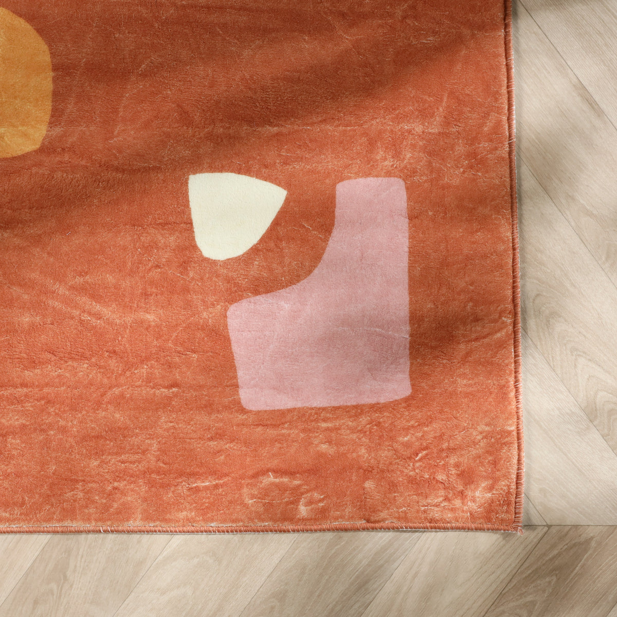 Washable children’s rug - Billy Shapes Terracotta